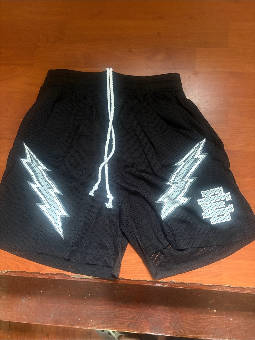 Eric Emanuel Black Mesh Shorts with White Lightning Accents
